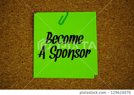 Become a Sponsor text message on stick note on cork paper background 129628876