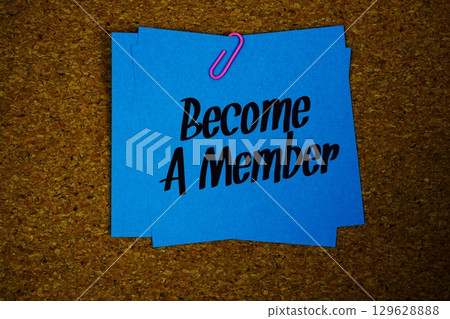 Become A Member text message on stick note on cork paper background 129628888