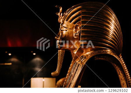 Golden Funerary Mask Of Tutankhamen. Tutankhamun Famous Pharaoh In Ancient Egypt 129629102
