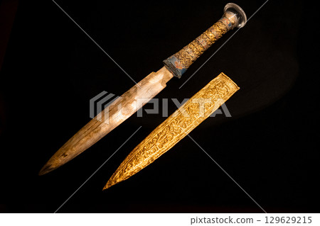 Ancient Egyptian Ceremonial Dagger with Ornate Gold Sheath 129629215