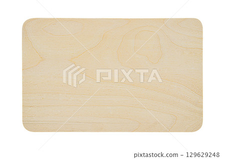Top surface of wooden cutting board with characteristic lines of birch plywood longitudinal section isolated on white background. Blank for artworks kitchen, countertop theme, copy space for ads 129629248