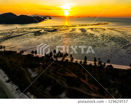 Aerial view sunset sky,Nature beautiful Light Sunset or sunrise over sea,Colorful dramatic majestic scenery sunset Sky with Amazing clouds and waves in sunset sky nature light cloud background Aerial view sunset sky,Nature beautiful Light Sunset or sunrise over sea,Colorful dramatic majestic scenery sunset Sky with Amazing clouds and waves in sunset sky nature light cloud background 129629557