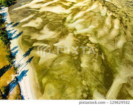 Aerial view of sandbar with turquoise sea at Laem had Koh khao yai Phang Nga Thailand, summer background and summer holiday concept Aerial view of sandbar with turquoise sea at Laem had Koh khao yai Phang Nga Thailand, summer background and summer holiday concept 129629582