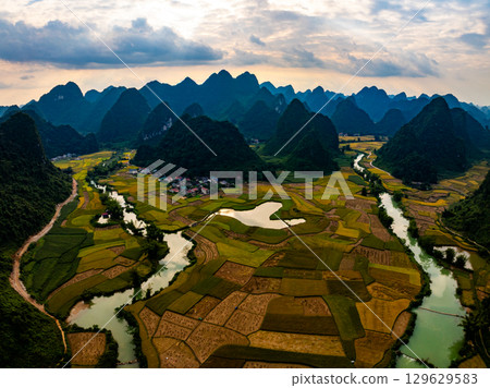 Drone aerial view of landscape mountains view in sunrise or sunset time,High angle view over countryside at northern Vietnam Drone aerial view of landscape mountains view in sunrise or sunset time,High angle view over countryside at northern Vietnam 129629583