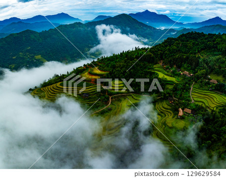 Drone aerial view of landscape mountains view in sunrise or sunset time,High angle view over countryside at northern Vietnam Drone aerial view of landscape mountains view in sunrise or sunset time,High angle view over countryside at northern Vietnam 129629584