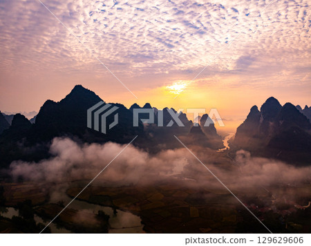 Drone aerial view of landscape mountains view in sunrise or sunset time,High angle view over countryside at northern Vietnam 129629606