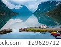 Family vacation travel RV, holiday trip in motorhome, Caravan car Vacation. 129629712