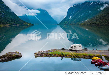 Family vacation travel RV, holiday trip in motorhome, Caravan car Vacation. Family vacation travel RV, holiday trip in motorhome, Caravan car Vacation. 129629712