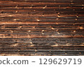 Background made of old faded wood texture 129629719