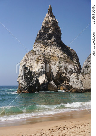 Majestic Coastal Cliffs Combined with a Beautifully Serene Beachscape Await Your Visit Majestic Coastal Cliffs Combined with a Beautifully Serene Beachscape Await Your Visit 129630590