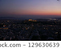 A beautiful twilight view of Athens showcasing the iconic Acropolis skyline is mesmerizing 129630639