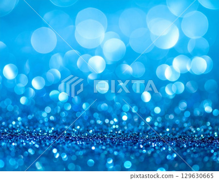 Sparkling light blue bokeh background material 129630665