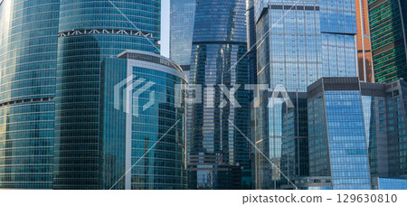 urban background, glass walls of business center skyscrapers urban background, glass walls of business center skyscrapers 129630810