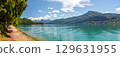 path along the lake Wolfgangsee, Zwolferhorn mountain in the background, Sankt Gilgen, Austria 129631955