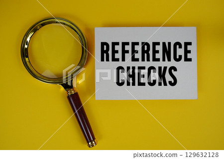 Reference Checks text written on paper with magnifying glass Reference Checks text written on paper with magnifying glass 129632128