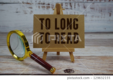 To Long To Read text written on paper with magnifying glass To Long To Read text written on paper with magnifying glass 129632155