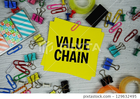 Value Chain text on stick note with stationery on concrete background 129632495