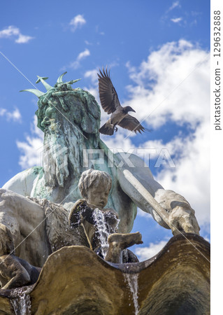 Berlin, Germany - July 01, 2018: Fragment of the Neptune Fountain in the center of Berlin 129632888