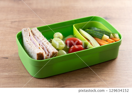 Healthy Lunchbox for school with sandwich,fruit and vegetables Healthy Lunchbox for school with sandwich,fruit and vegetables 129634152