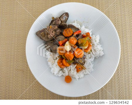 Chicken liver and gizzard with sauteed vegetables and white rice Chicken liver and gizzard with sauteed vegetables and white rice 129634542