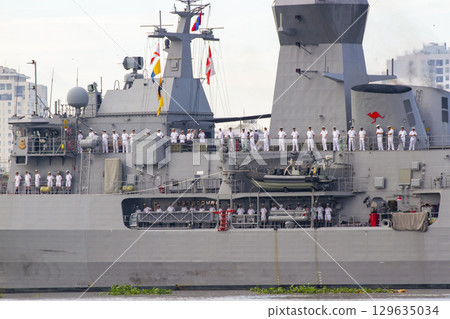 Navy Sailors Lined Up To Say Goodbye On Board Of HMAS Toowoomba (FFH 156) Frigate Of Royal Australian Navy. Navy Sailors Lined Up To Say Goodbye On Board Of HMAS Toowoomba (FFH 156) Frigate Of Royal Australian Navy. 129635034