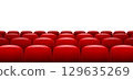 Rows red theater seats in cinema auditorium. Red chairs cinema background concert on white 129635269