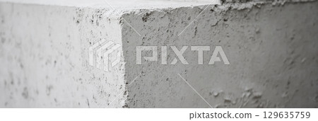 Construction site detail of freshly applied cement showing texture and technique in urban setting Construction site detail of freshly applied cement showing texture and technique in urban setting 129635759