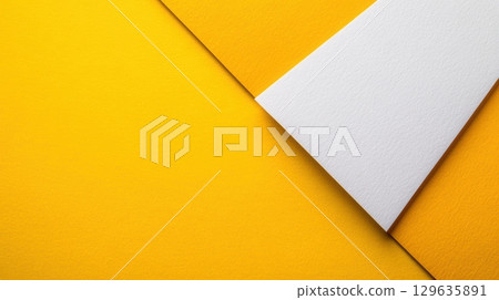 Bright yellow and white paper creates vibrant contrast for creative design projects Bright yellow and white paper creates vibrant contrast for creative design projects 129635891