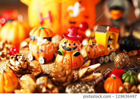 A lively Halloween party image with ghosts 129636497