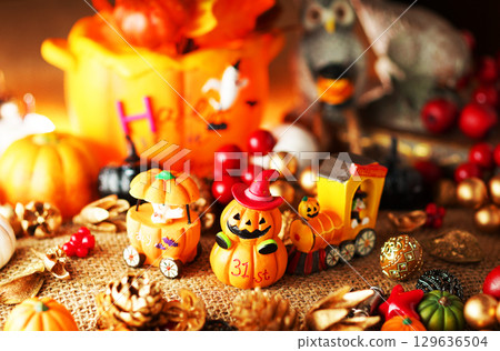 A lively Halloween party image with ghosts A lively Halloween party image with ghosts 129636504
