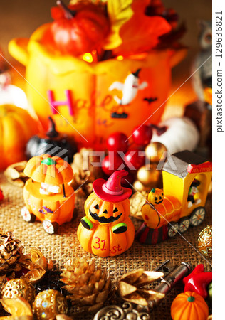A lively Halloween party image with ghosts 129636821