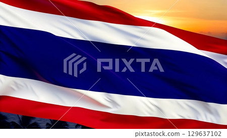 Waving thailand flag with sunset background in a patriotic representation 129637102