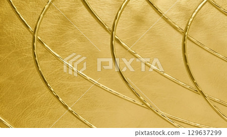 Abstract gold foil wires arranged in graceful intersecting arcs on reflective metallic background for luxury design 129637299