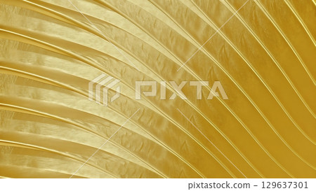 Abstract gold foil texture with curved ridges and shimmering metallic surface in elegant diagonal flow 129637301