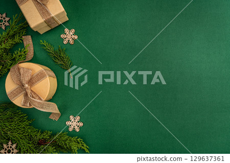 Rustic Christmas Flat Lay with Gifts and Pine Cones Rustic Christmas Flat Lay with Gifts and Pine Cones 129637361