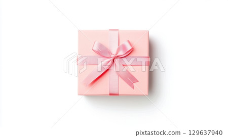 Elegant guava pink gift box with satin ribbon isolated on white for celebrations, branding and festive visuals 129637940