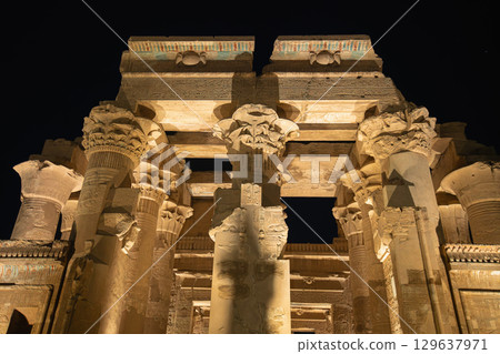 Temple of Kom Ombo front facade with decorated columns at night Egypt. 129637971