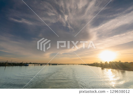 Sunset Bridge over Nile River near Temple of Luxor Egypt. Sunset Bridge over Nile River near Temple of Luxor Egypt. 129638012