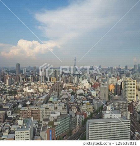 A landscape of Tokyo's cityscape and sky. An illustration-style photo. 129638831