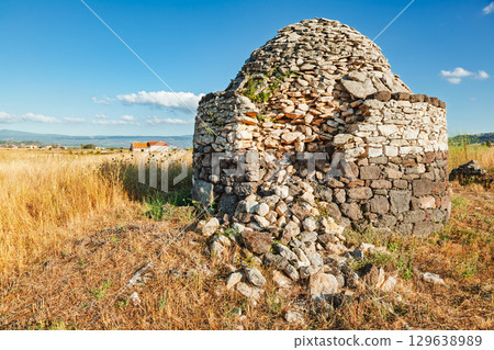 Ancient megalithic Nuraghe stone structure in Sardinia Italy Ancient megalithic Nuraghe stone structure in Sardinia Italy 129638989