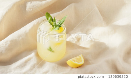 Elegant minimal scene with citrus jargarita and soft natural shadows 129639220