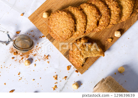 Oatmeal cookies with hazelnuts. Flat lay 129639639