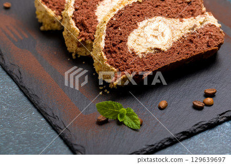Chocolate roll with banana 129639697