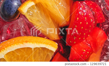 glass of drink with fruits 129639721