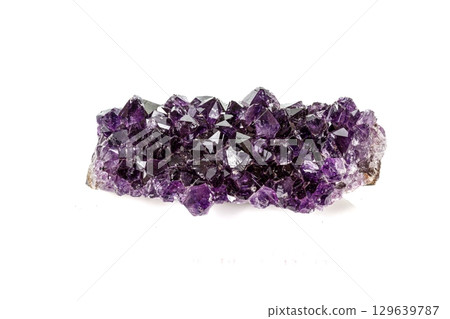Amethyst Crystal Druse  macro mineral on white background 129639787