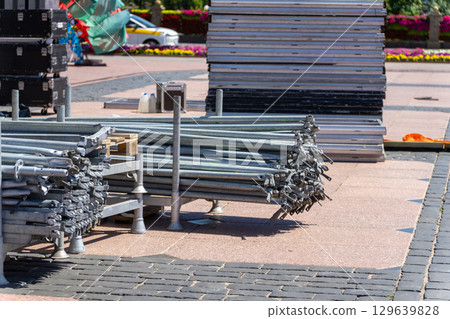 Stacked metal structures for assembling an open-air concert stage 129639828