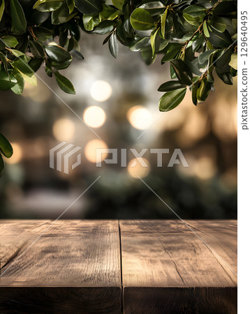 Black kitchen room background for zoom calls. Minimal dark room with wooden table in foreground 129640495