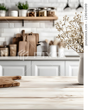 white kitchen room background for zoom calls. Minimal light room with wooden table in foreground 129640499