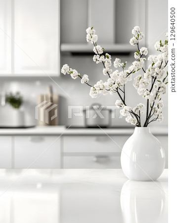 white kitchen room background for zoom calls. Minimal light room with wooden table in foreground 129640500