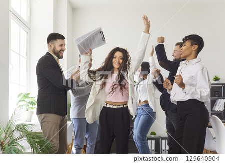 Portrait Of Happy Businesswoman Dancing At Meeting Portrait Of Happy Businesswoman Dancing At Meeting 129640904